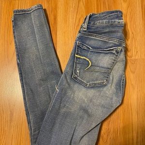 American Eagle Next Level Distressed Skinny Jeans